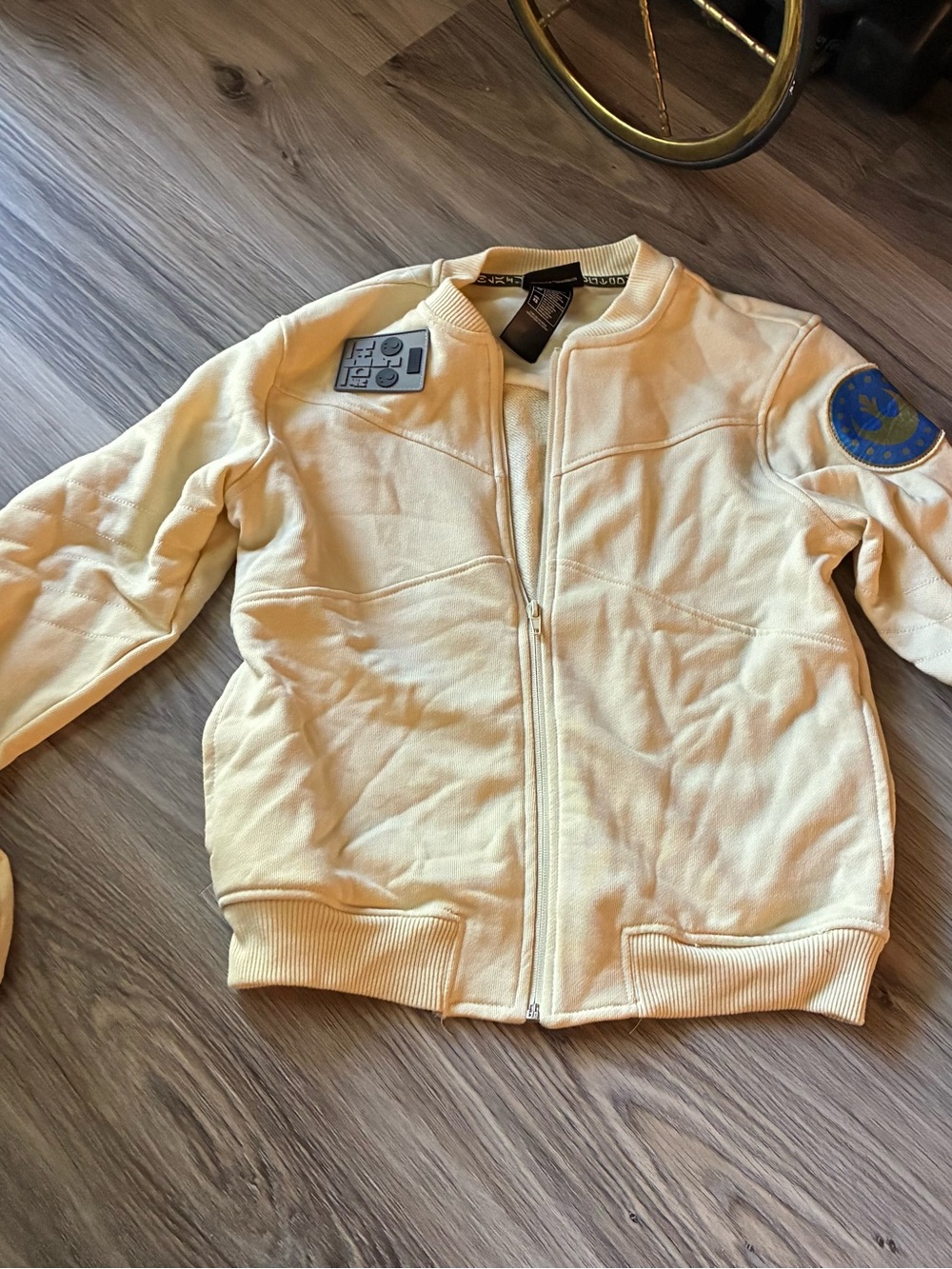 Disney Men's Pale Yellow Bomber Jacket with Patch Detail